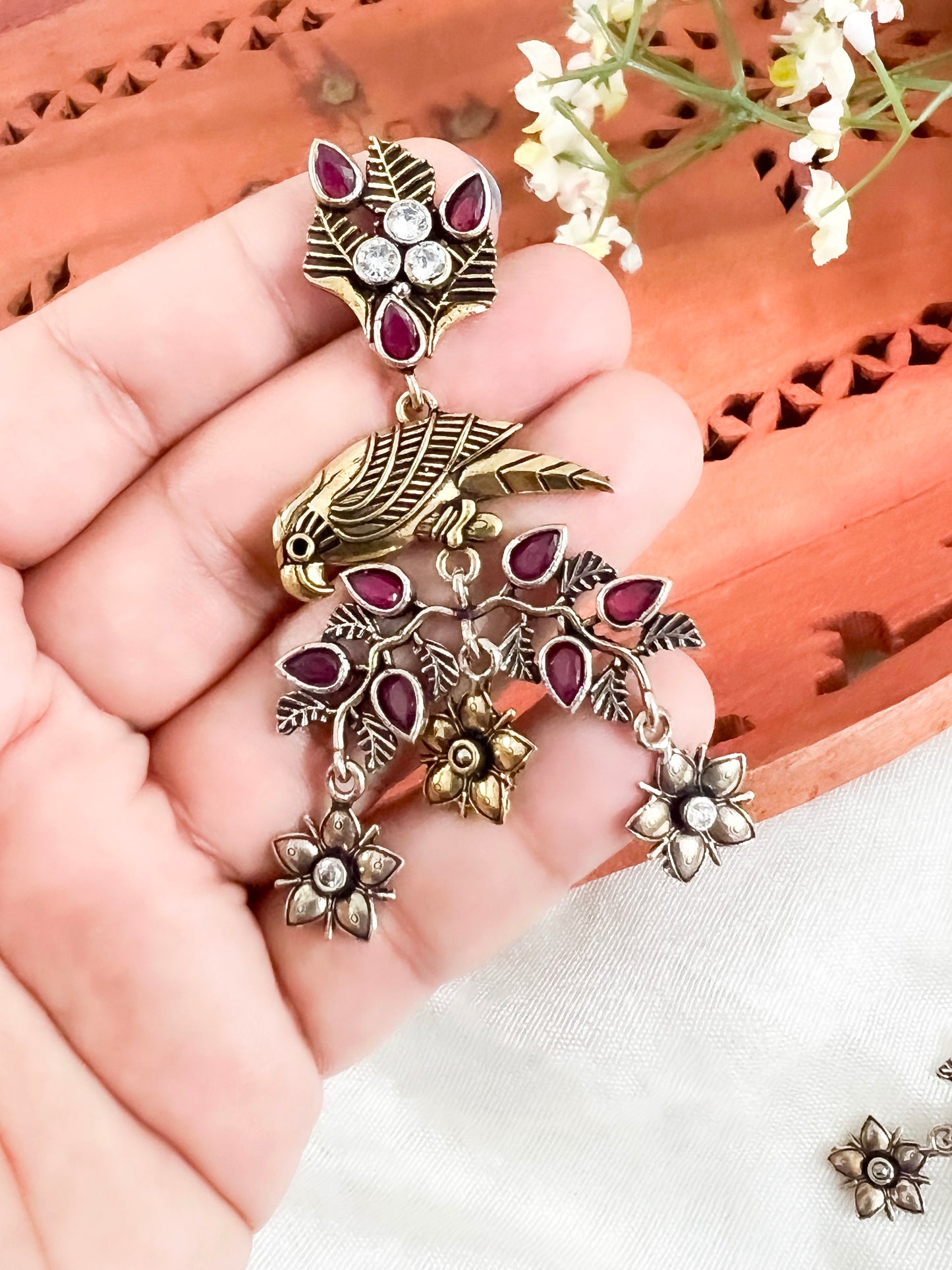Dual Tone Silver Replica Parrot Dangle Earrings available in Two Color variants : Black/Ruby