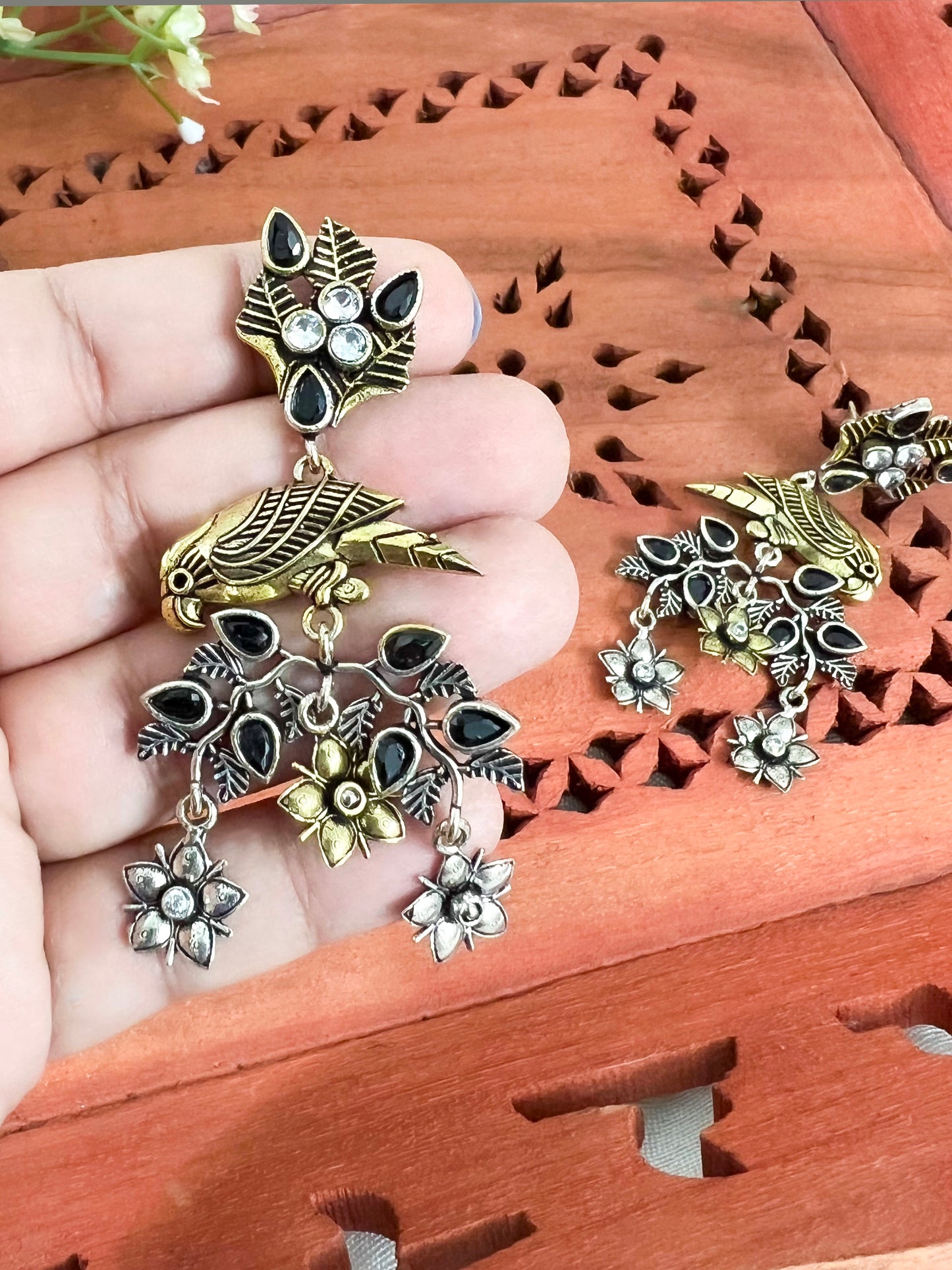 Dual Tone Silver Replica Parrot Dangle Earrings available in Two Color variants : Black/Ruby