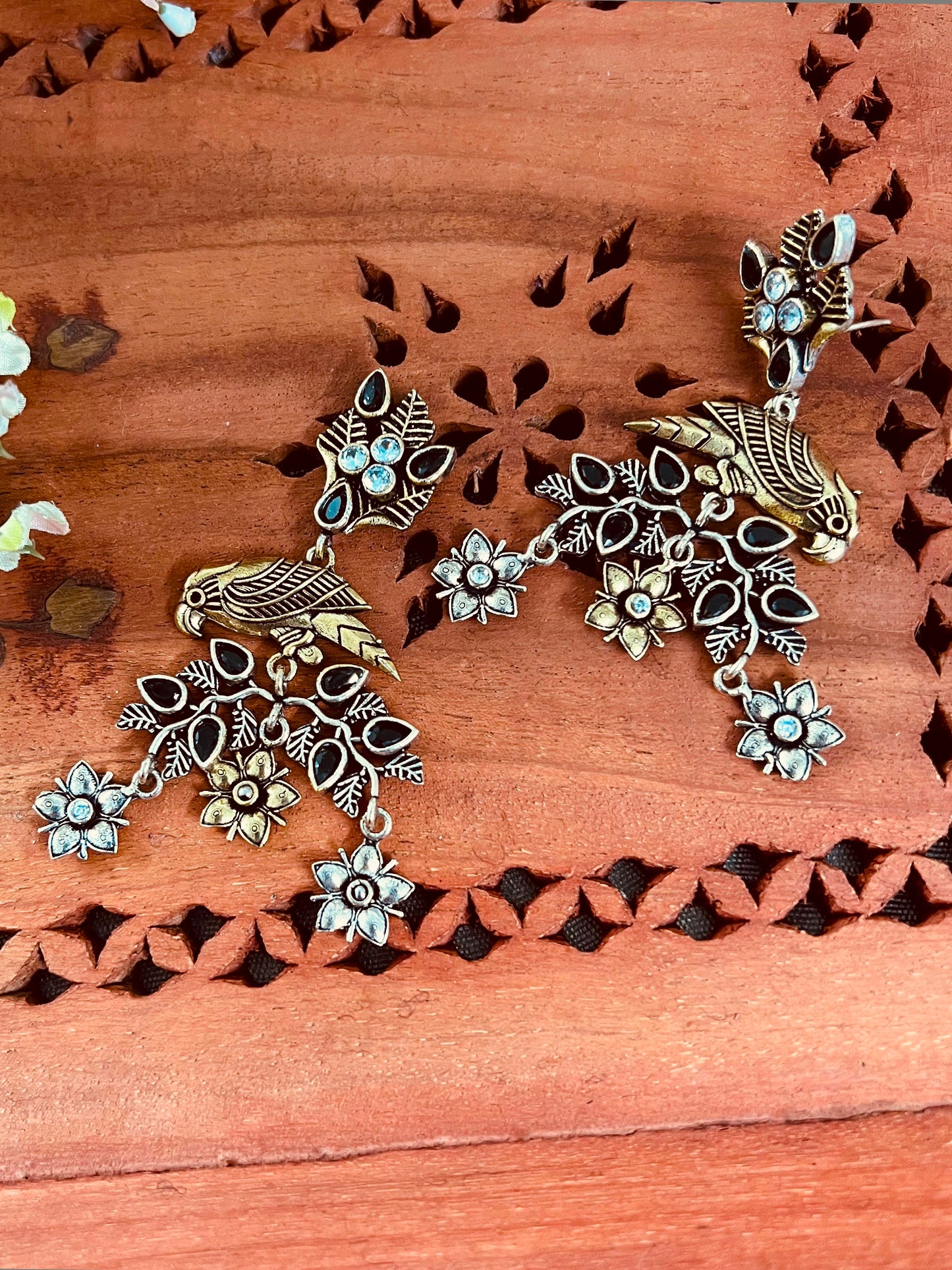 Dual Tone Silver Replica Parrot Dangle Earrings available in Two Color variants : Black/Ruby